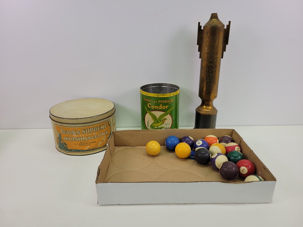 Brass Art Deco Trophy, Billiard Balls, and Antique Tins