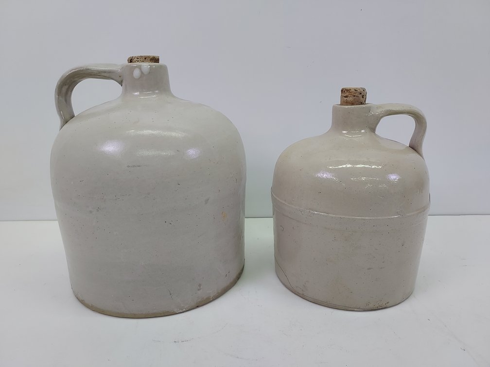 Pair of White Glazed Stoneware Jugs