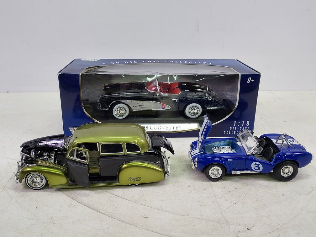 (2) 1/24 Scale Die-Cast Cars & (1) 1/18 Scale Car