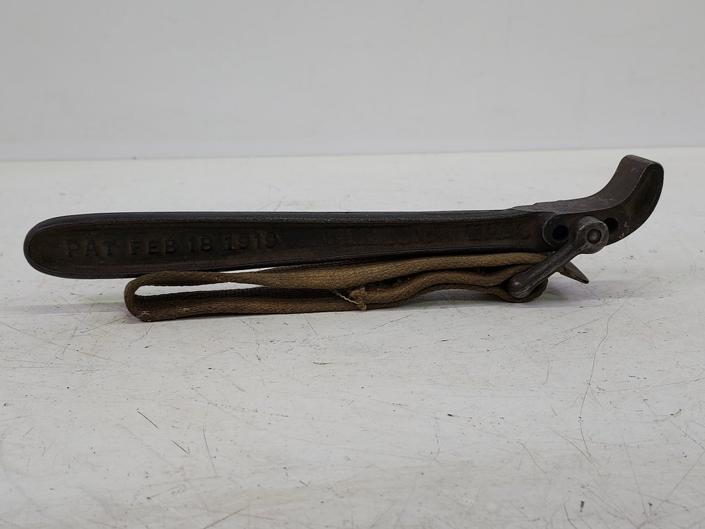 Vintage Warnock Cast Iron Strap Wrench