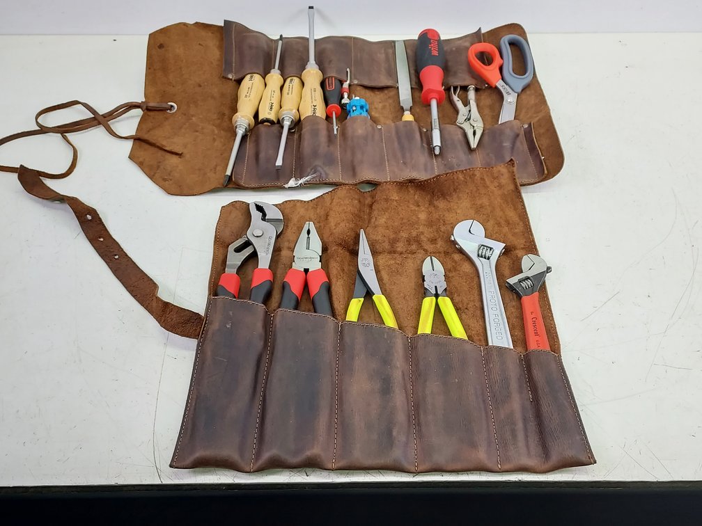Various Tools in Leather Tool Holders