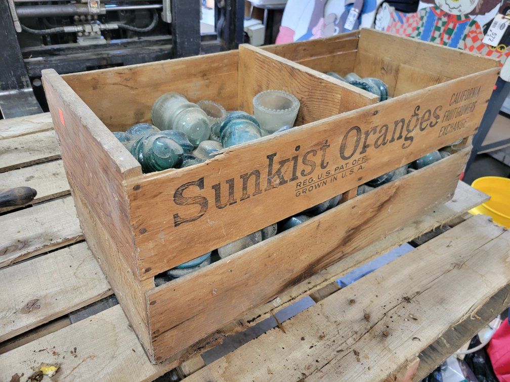 Glass Insulators in Sunkist Oranges Wood Crate