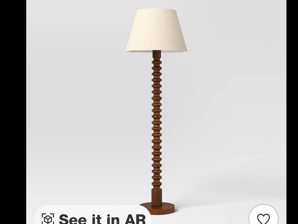 61 inch walnut wooden floor lamp with cream shade.