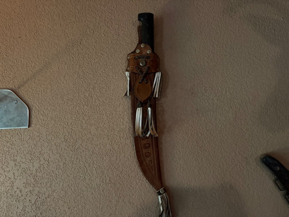 (2) traditional Latin-style large knives