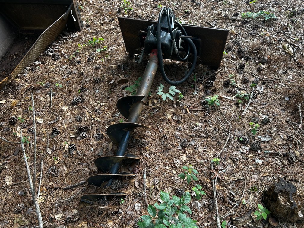 Skid steer auger attachment with 2 auger bits