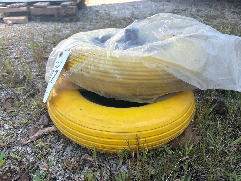 2 yellow wheel barrow wheels