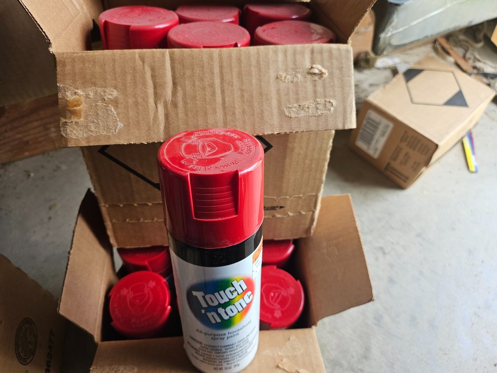 12 cans red spray paint