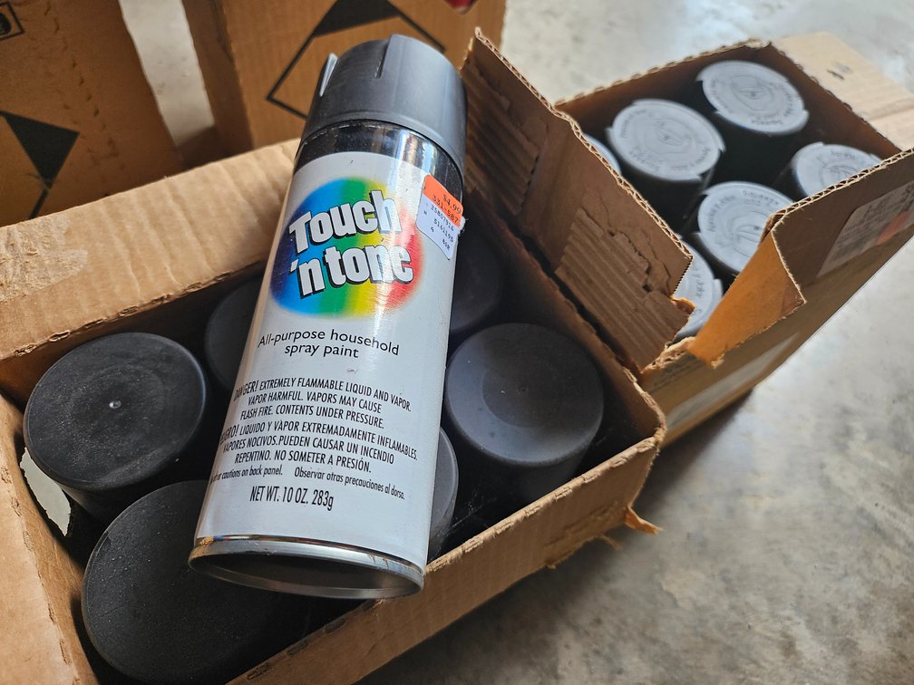 13 cans black spray paint