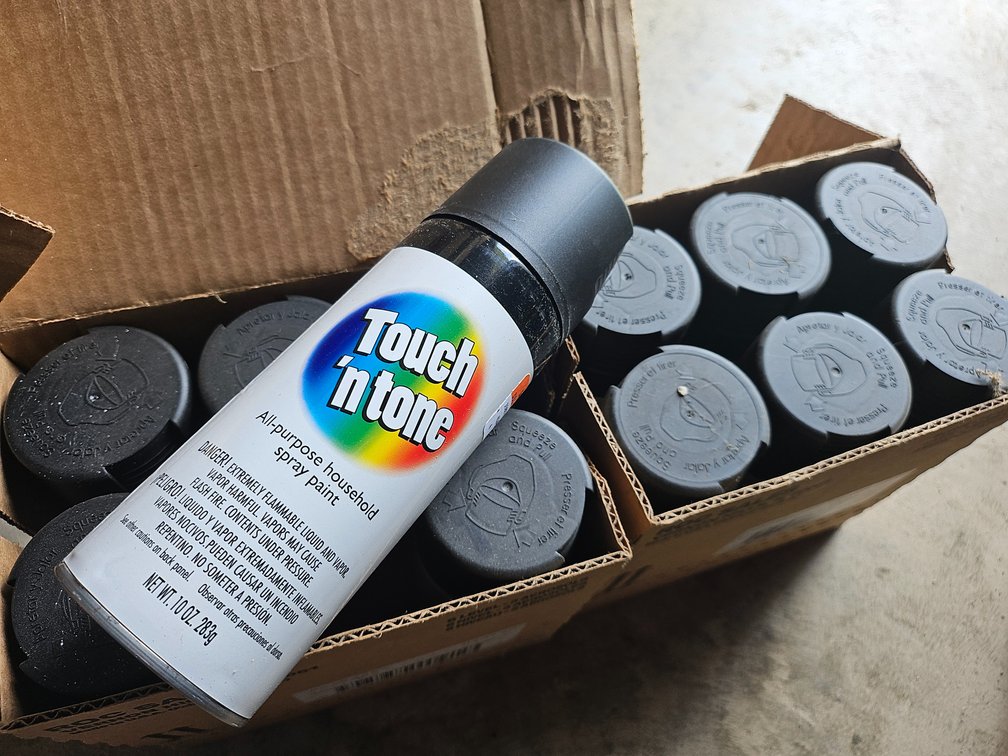 12 cans black spray paint