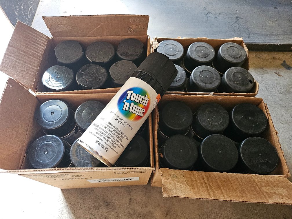 25 cans black spray paint