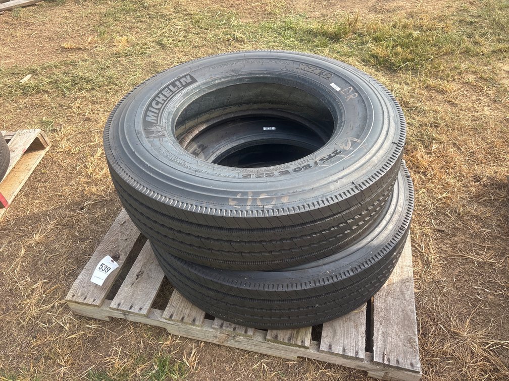 (2) Michelin 275/80 R22.5 tires