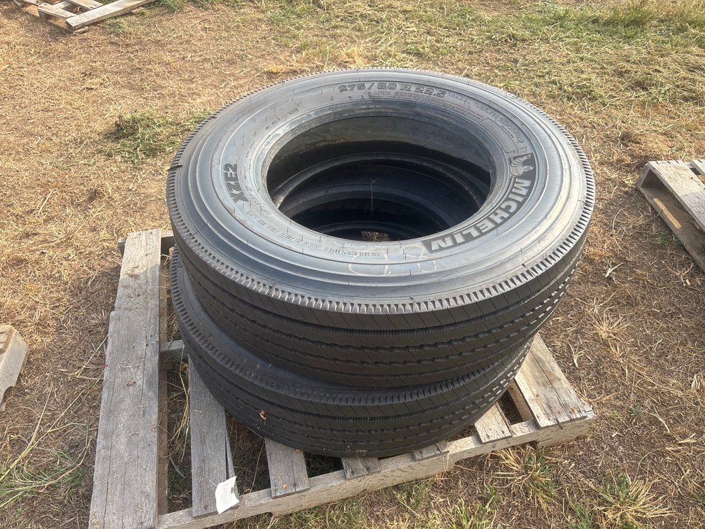 (2) Michelin 275/80 R22.5 tires
