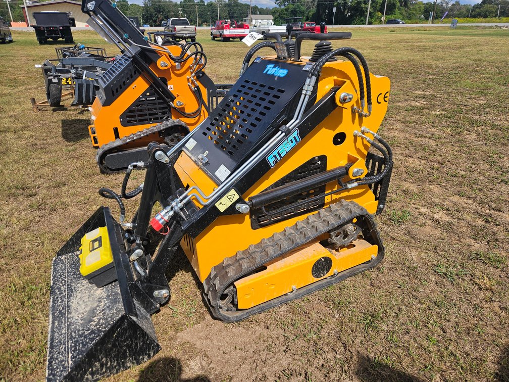 Mini stand on skid steer loader