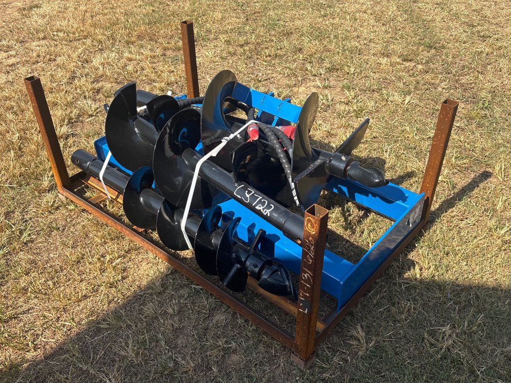 Skid steer post hole digger