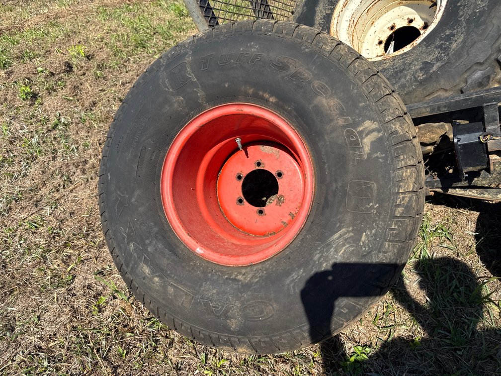 Two tires with orange wheels 41/18 LL by 16.1