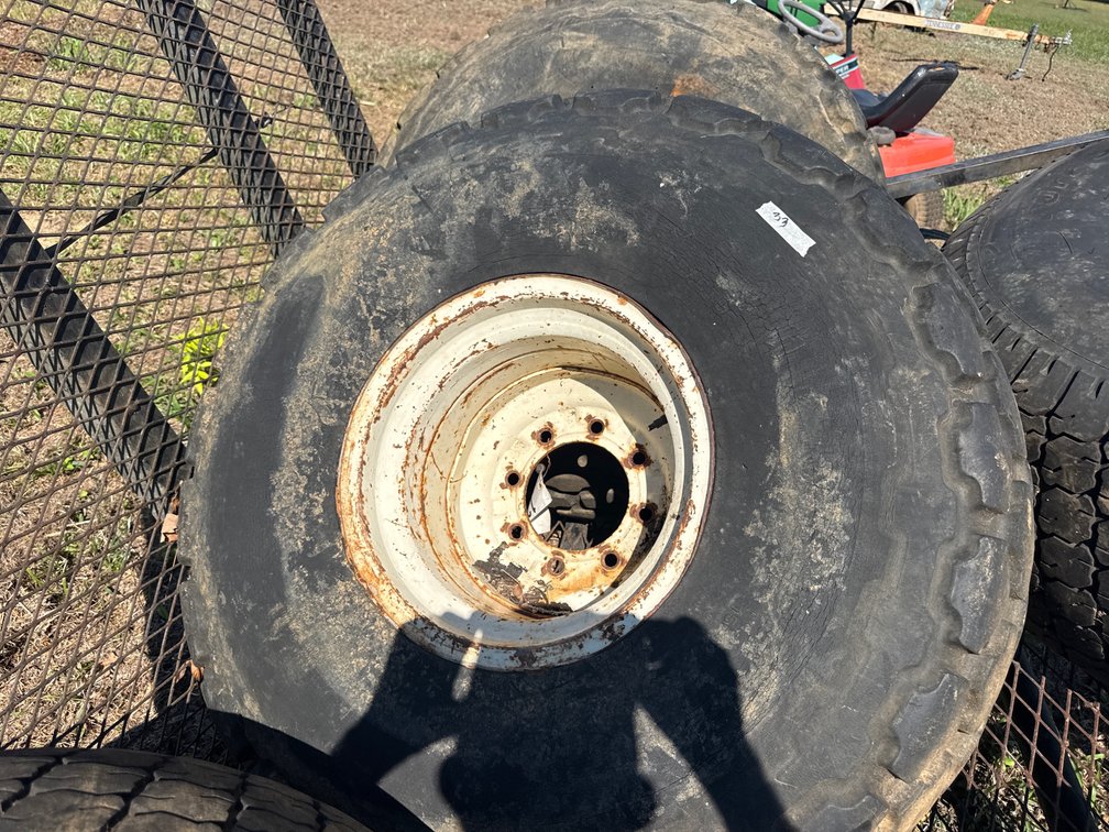 Two tires with white wheels 18.4–16.1