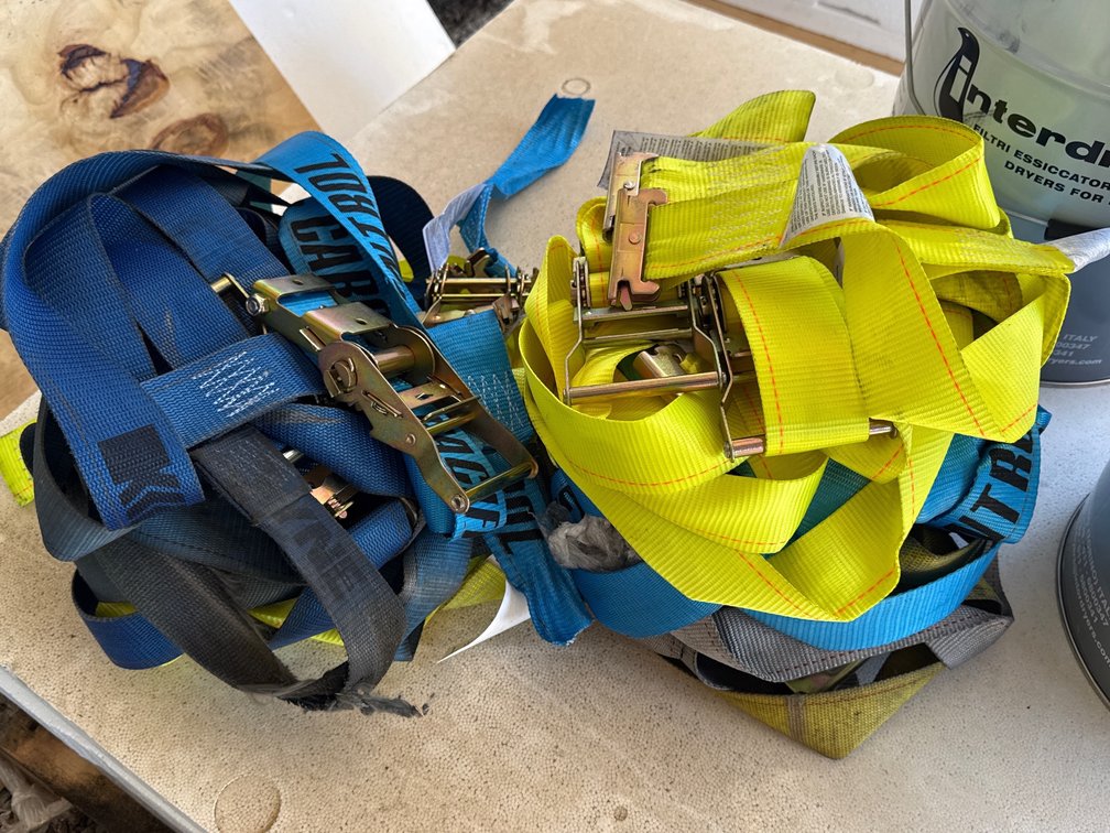 2 Buckets of straps some straps are damaged