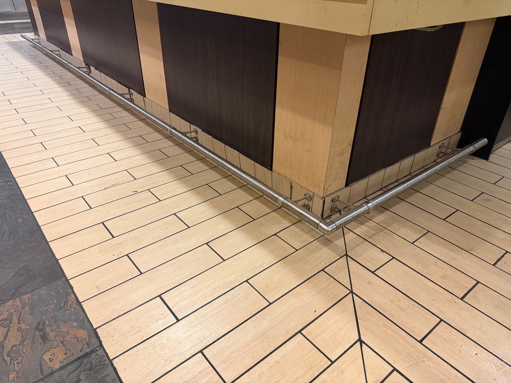 L-shaped stainless bar foot rail