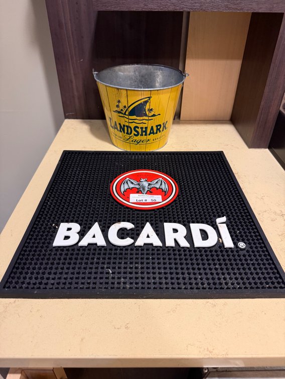 Lot: Bacardi bar mat & Landshark metal beer bucket