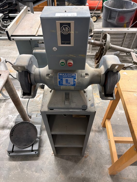 Baldor bench grinder with pedestal shelf