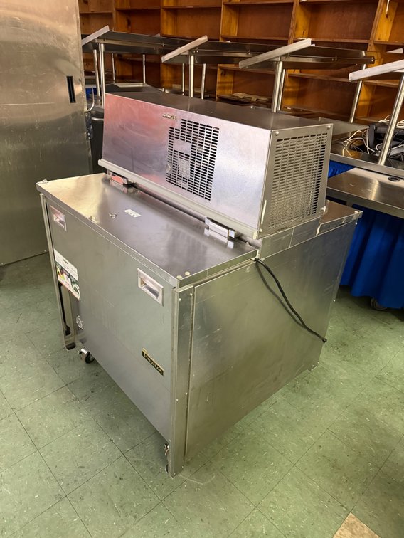 Traulsen reach-in cooler on wheels