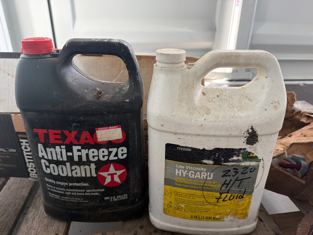 2 Half Jugs of antifreeze & Hy-Gard