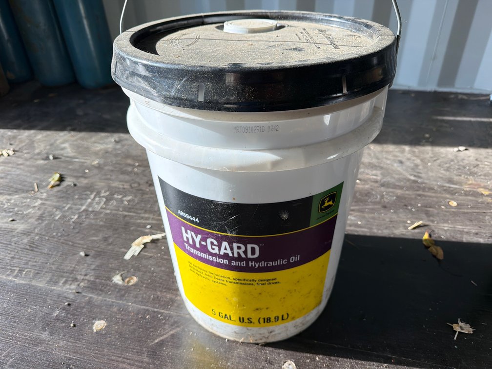 Bucket of John Deere Hy-Gard Oil