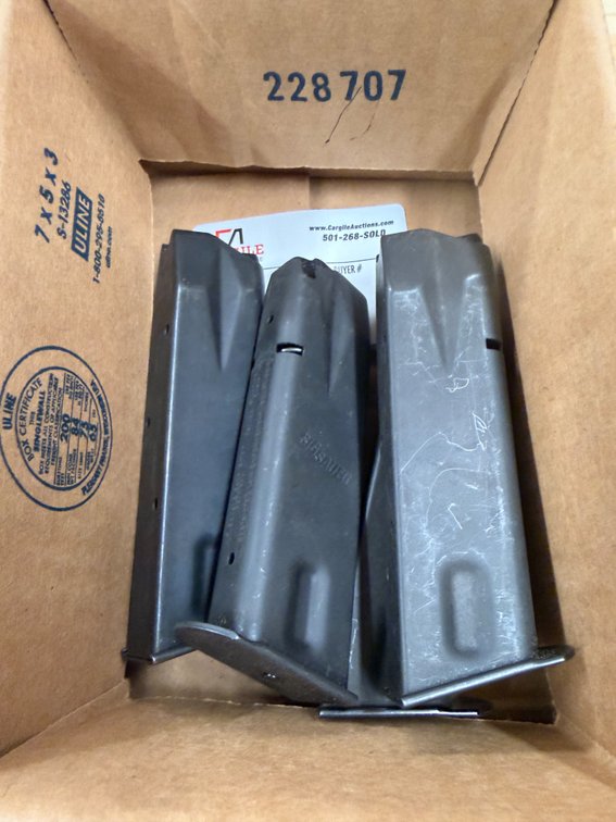 4 Sig Sauer Mags (caliber unknown)