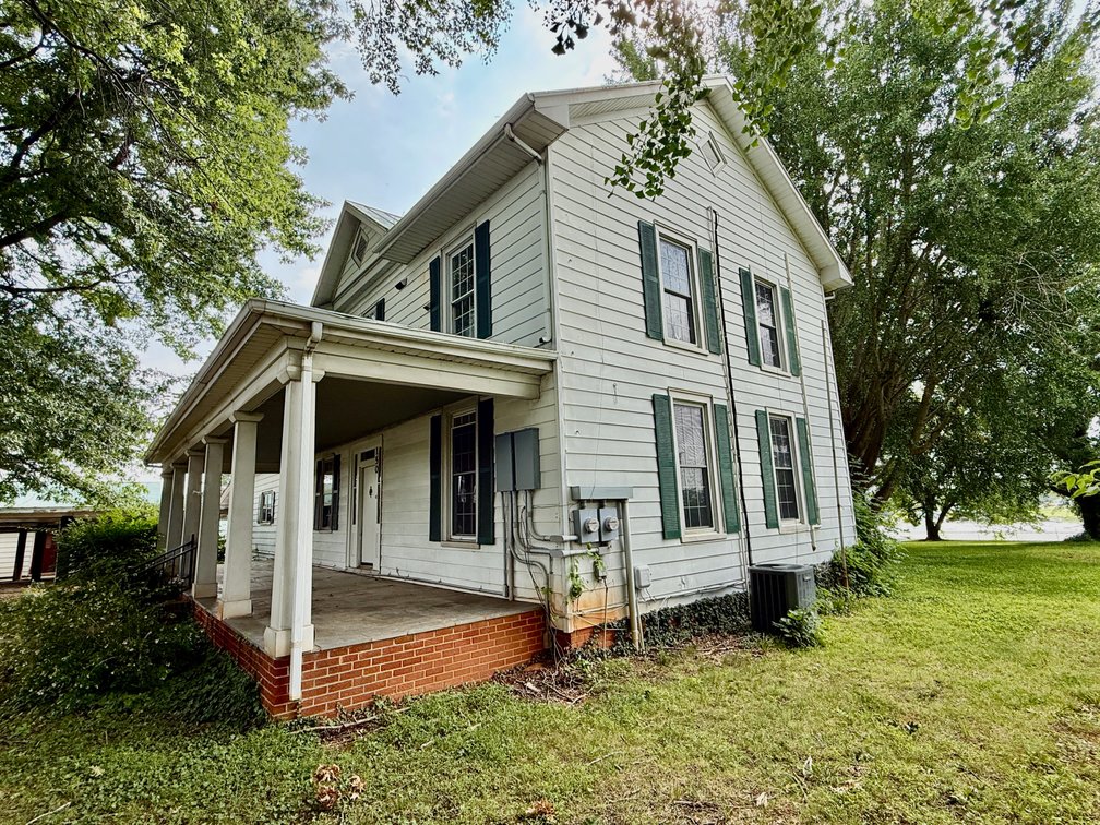 Image for 4 BR/2.5 BA Multi-Tenant Home and Large Detached Shop/Garage on 1.619 +/- Acres in Downtown Madison, VA--ONLINE ONLY BIDDING!!