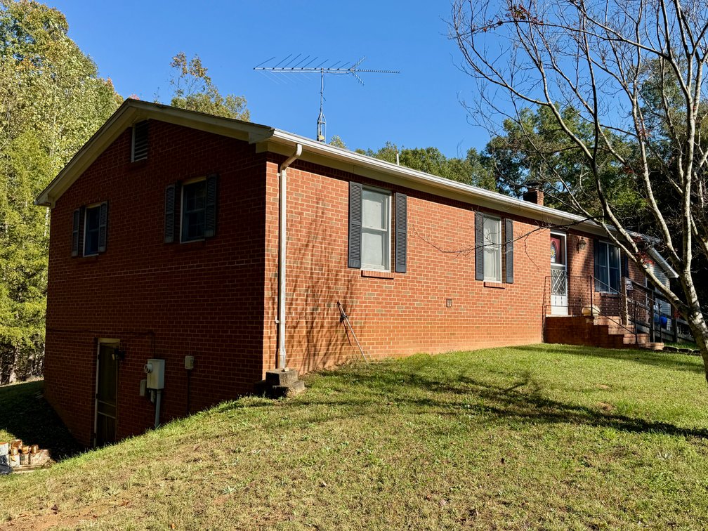 Image for 3 BR/1 BA Brick Home w/Walk-Out Basement & 2 Detached Garage/Shop/Storage Buildings on 14.1 +/- Mostly Wooded Acres--Orange, VA