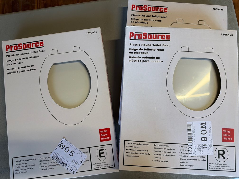 Lot of White Toilet Seats