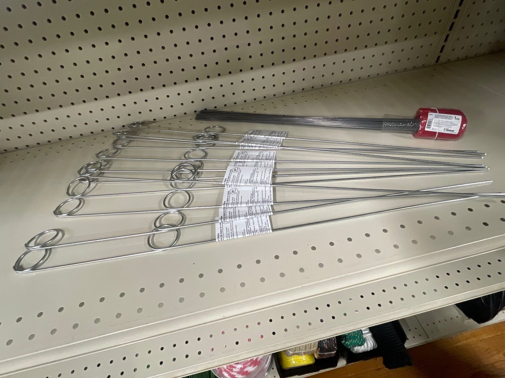 Lot of metal ground stakes and bungee cords