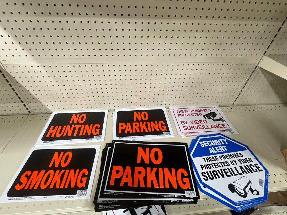 Lot of metal and paper signs