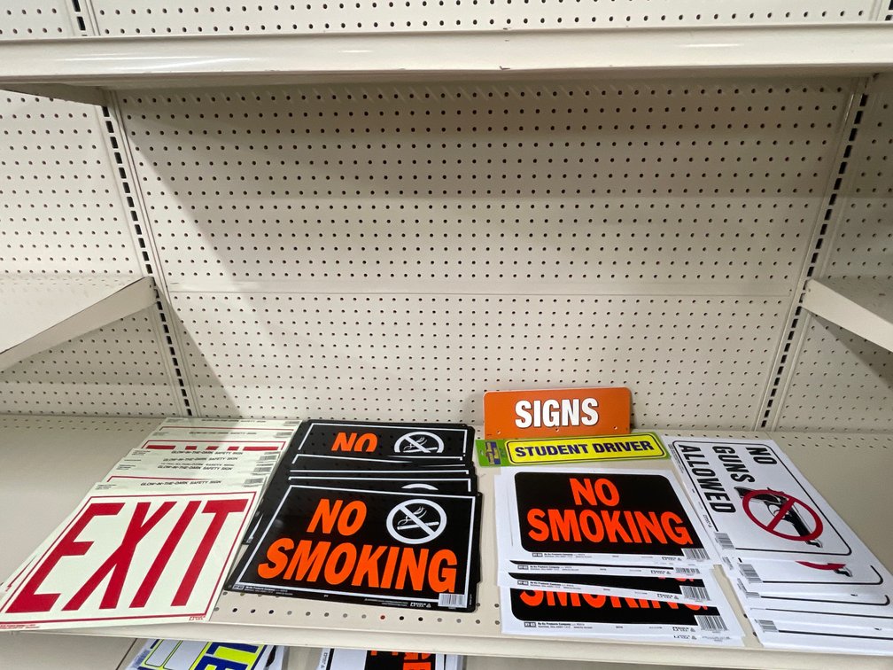 Lot of metal and paper signs