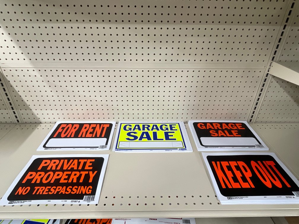 Lot of metal and paper signs
