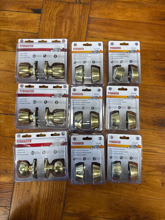Lot of deadbolts and doorknobs