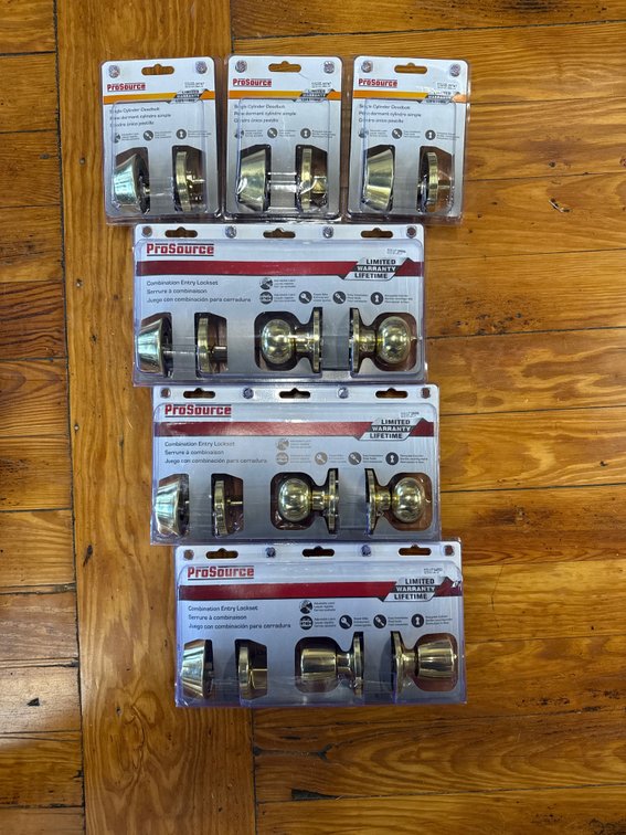 Lot of deadbolts and doorknobs