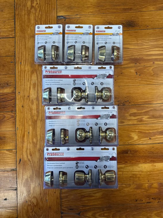 Lot of deadbolts and doorknobs