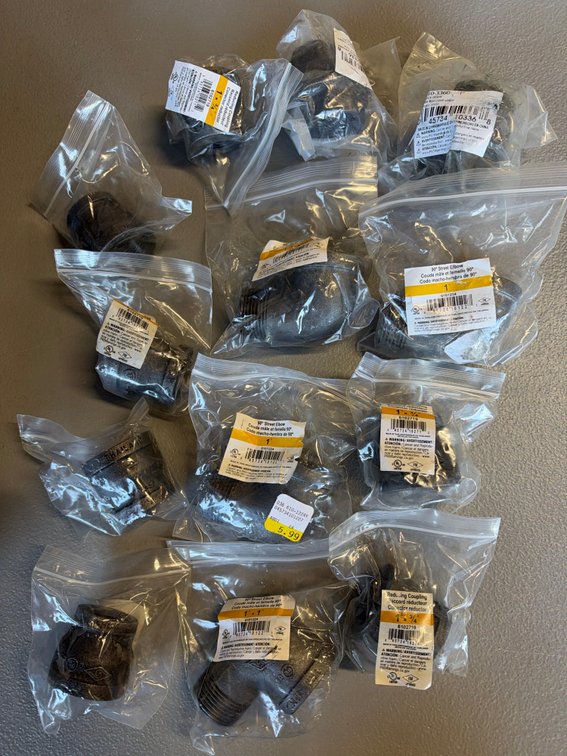 Lot of Black Iron Coupling, Unions, and Elbows