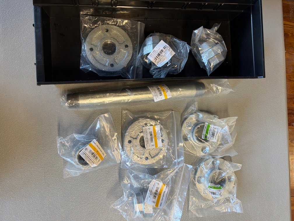 Lot of floor flanges, pipe nipple. and unions