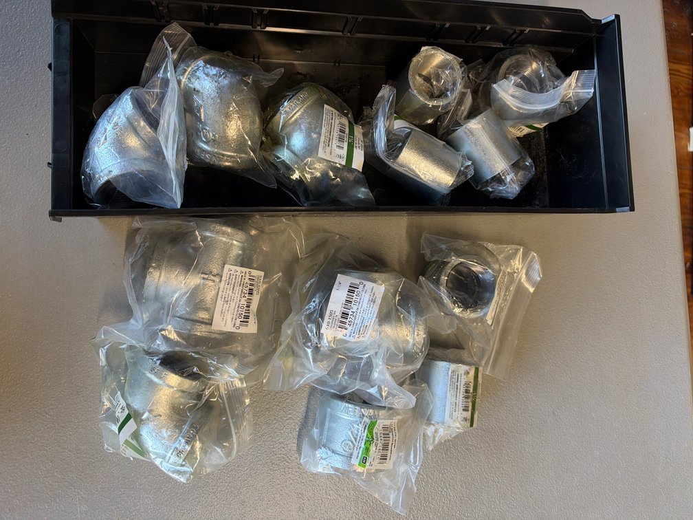 Lot of pipe couplings and elbows