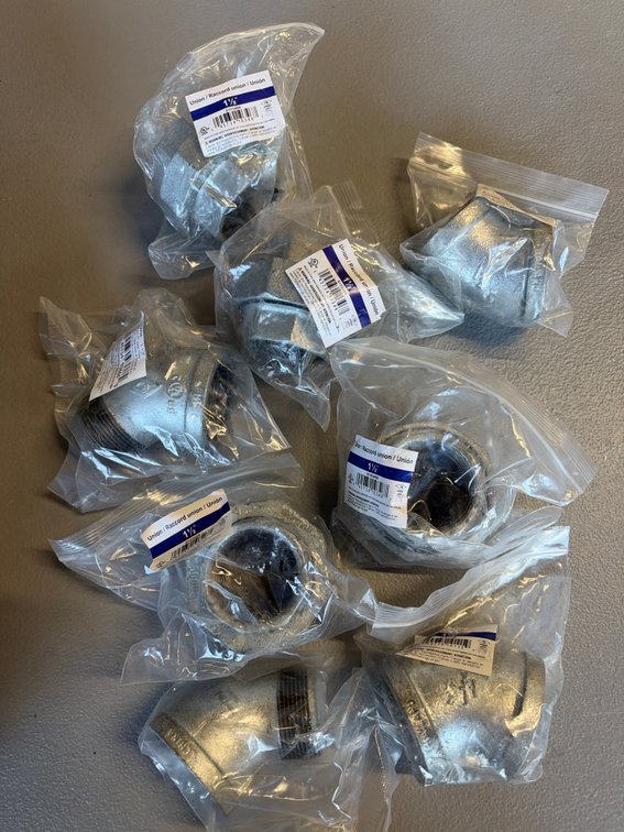Lot of pipe unions and elbows