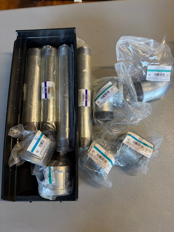 Lot of pipe elbows, nipples, couplings
