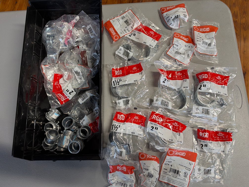 Lot of two hole straps, couplings