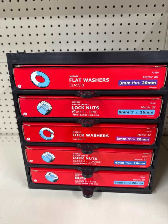 Lot of metric washers and nuts as pictured