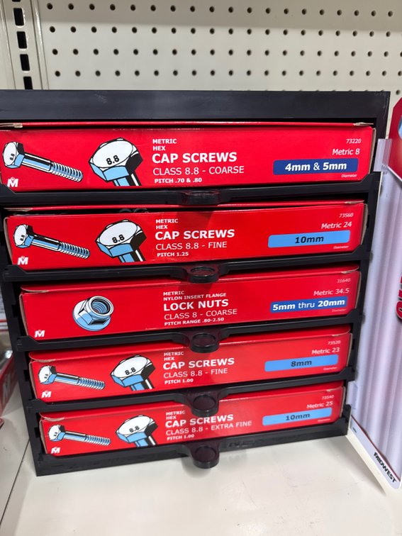Lot of metric cap screws and lock nuts as pictured