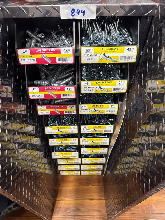 Large lot of lag shields and lag screws and bins