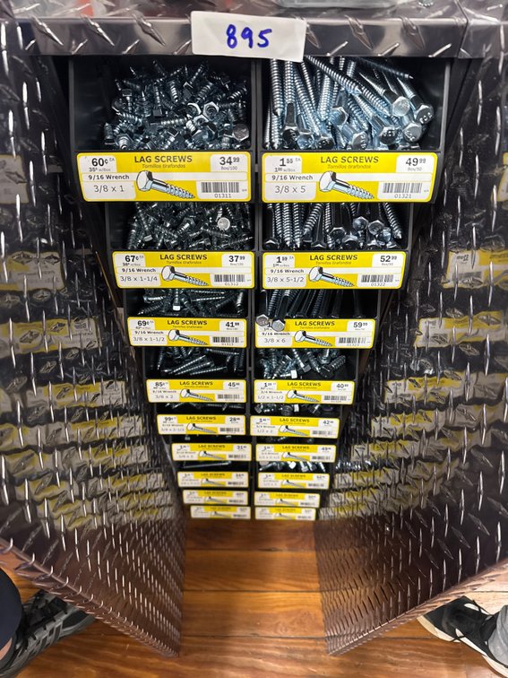 Large lot of lag screws and bins