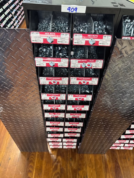 Large lot of hex cap screws, washers and hexnuts and bins