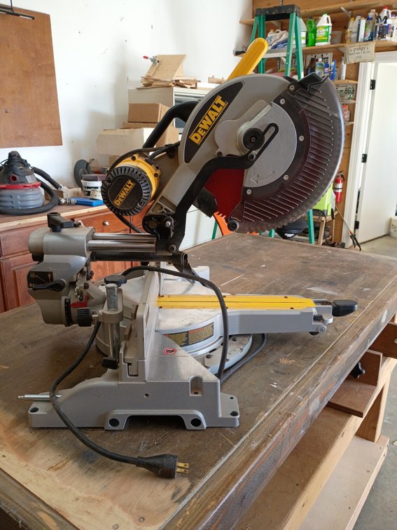 DeWalt 12-inch double-bevel sliding compound miter saw, most closely matching the DeWalt DWS779 or DWS780 models